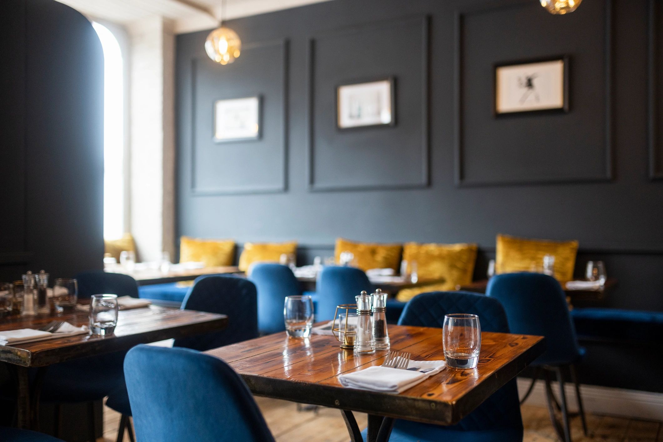 Dining room with tables set at a restaurant